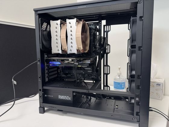 Near-complete build with the graphics card seated and airflow fans fitted