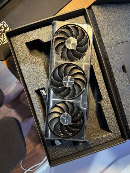 Triple-fan RTX 5060 Ti graphics card fresh out of its box
